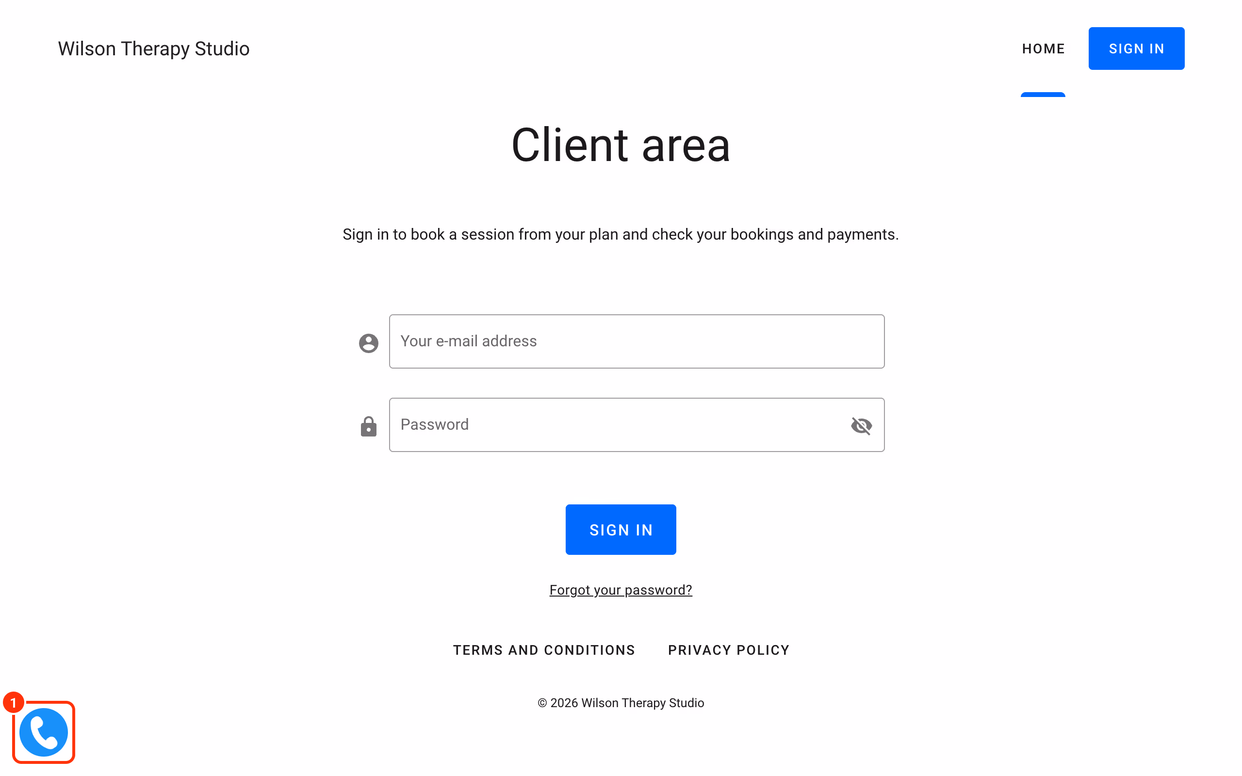 The round phone button in the bottom left corner of the website (1).